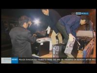South Korean workers load computers into the back of a truck after returning from the Kaesong Industrial Zone, in this image from KBS TV on April 30, 2013.