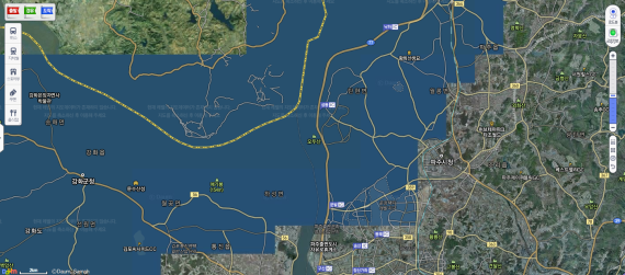 A satellite view of the Korean border from Daum Maps. The area between South Korea (to the right) and North Korea doesn't include satellite imagery at fine resolution for security purposes. The imagery is available on Google Maps.